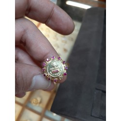 Round bold gold ring with...
